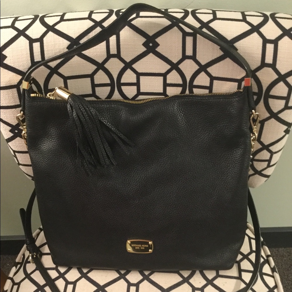 Michael Kors black pebble leather crossbody.
